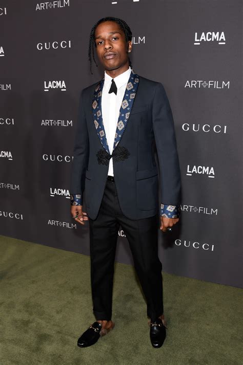 SPOTTED: ASAP Rocky In Gucci Suit + Fur Loafers .